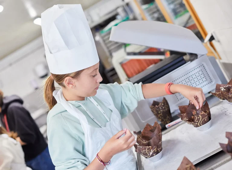 Students enjoying chocolate cooking during extracurricular activity at La Garenne