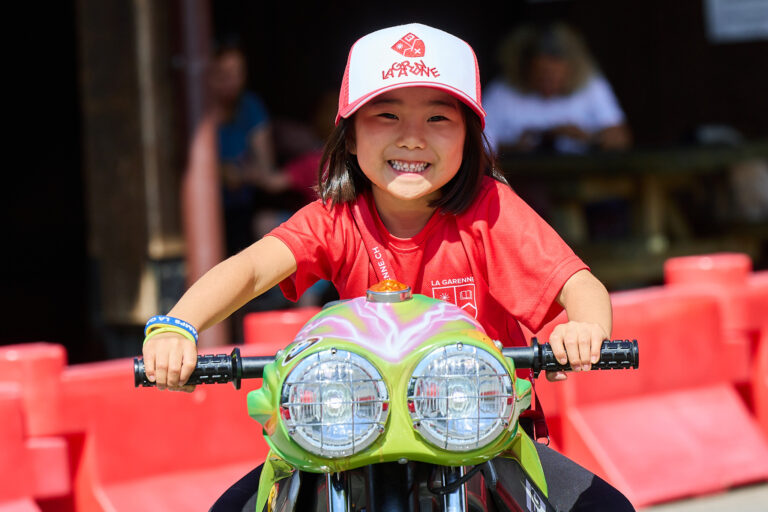 Students enjoying fun park activities during summer camp