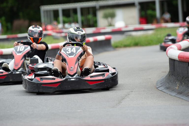 Students go karting during summer camp activity