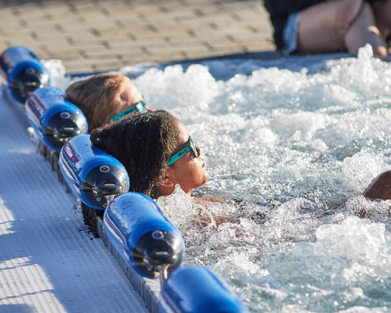 Students relaxing at thermal spa during summer programme