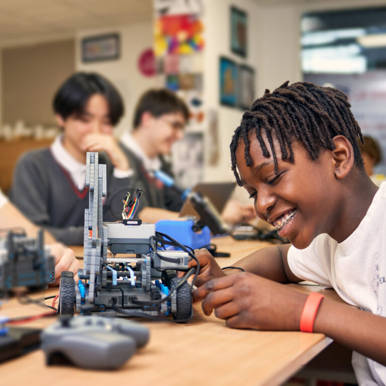 Students learning robotics and engineering at La Garenne International School