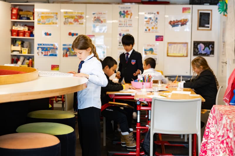 Primary School students working independently during a classroom lesson at La Garenne.