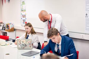 Teacher in class at La Garenne School