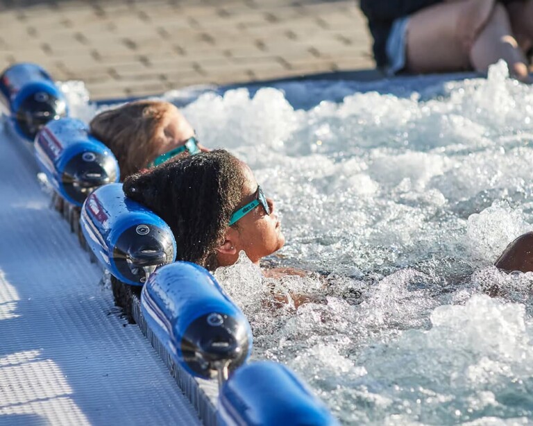 Students relaxing at thermal spa during summer programme