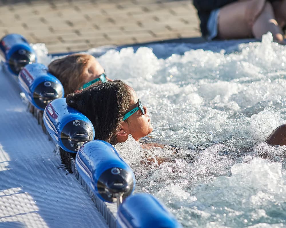 Students relaxing at thermal spa during summer programme