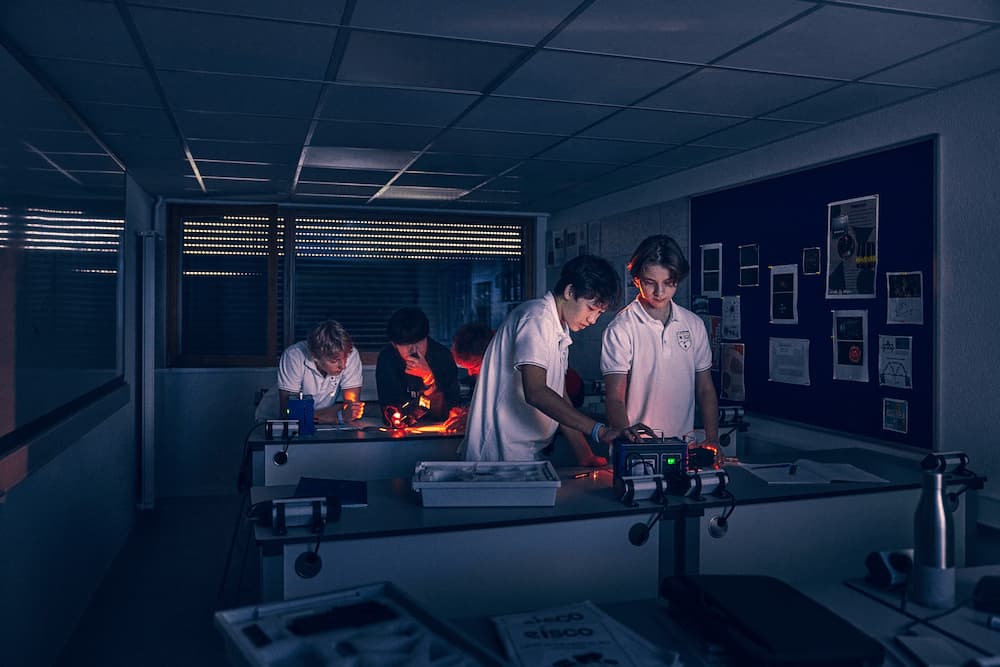 High School students carrying out a Physics investigation during a lesson at La Garenne.