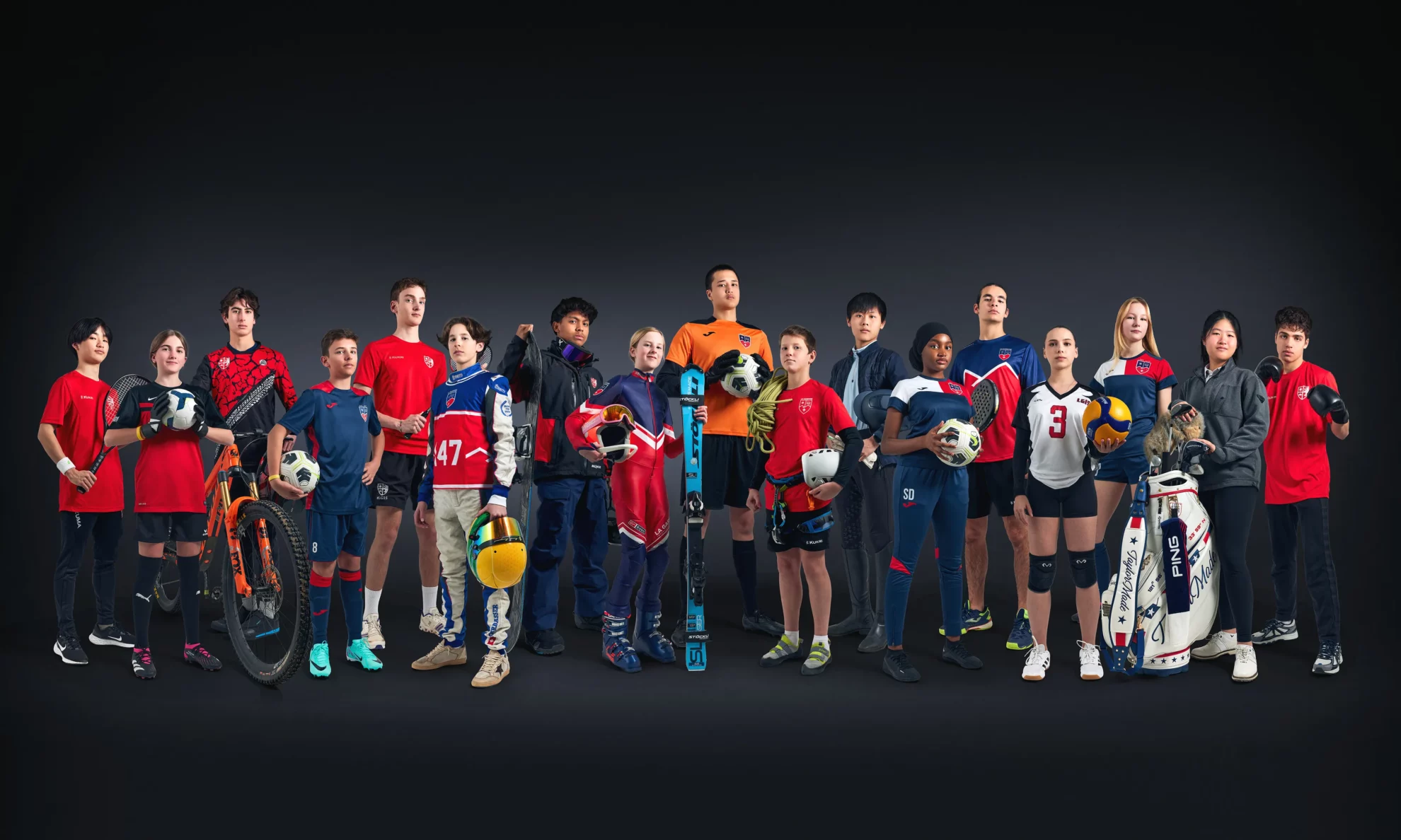 La Garenne student athletes from many sports posing together against a dark background